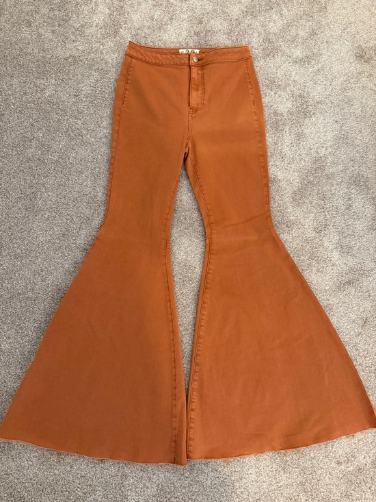 We The Free Denim - We The Free Flare Jeans in Rust